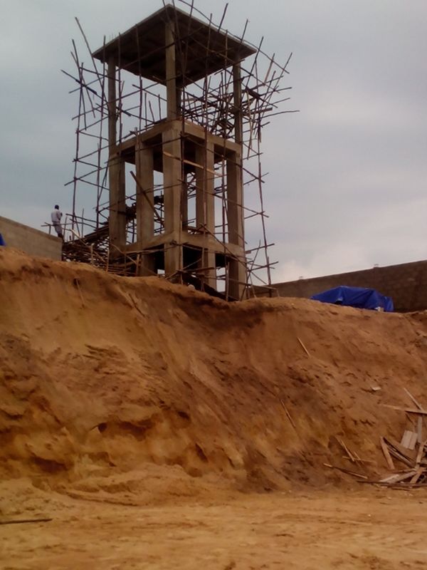 tank-farm-placeholder — industrial concrete structure on site