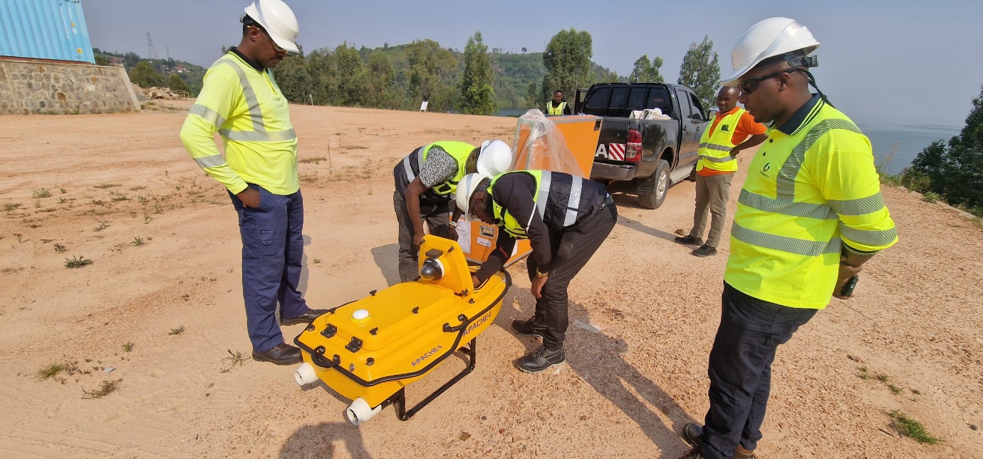 bathymetry-placeholder — team preparing an unmanned survey vessel at a lake shore